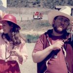 Tarun playing the triangle, with Roshani