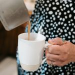 Mother pouring hot chocolate