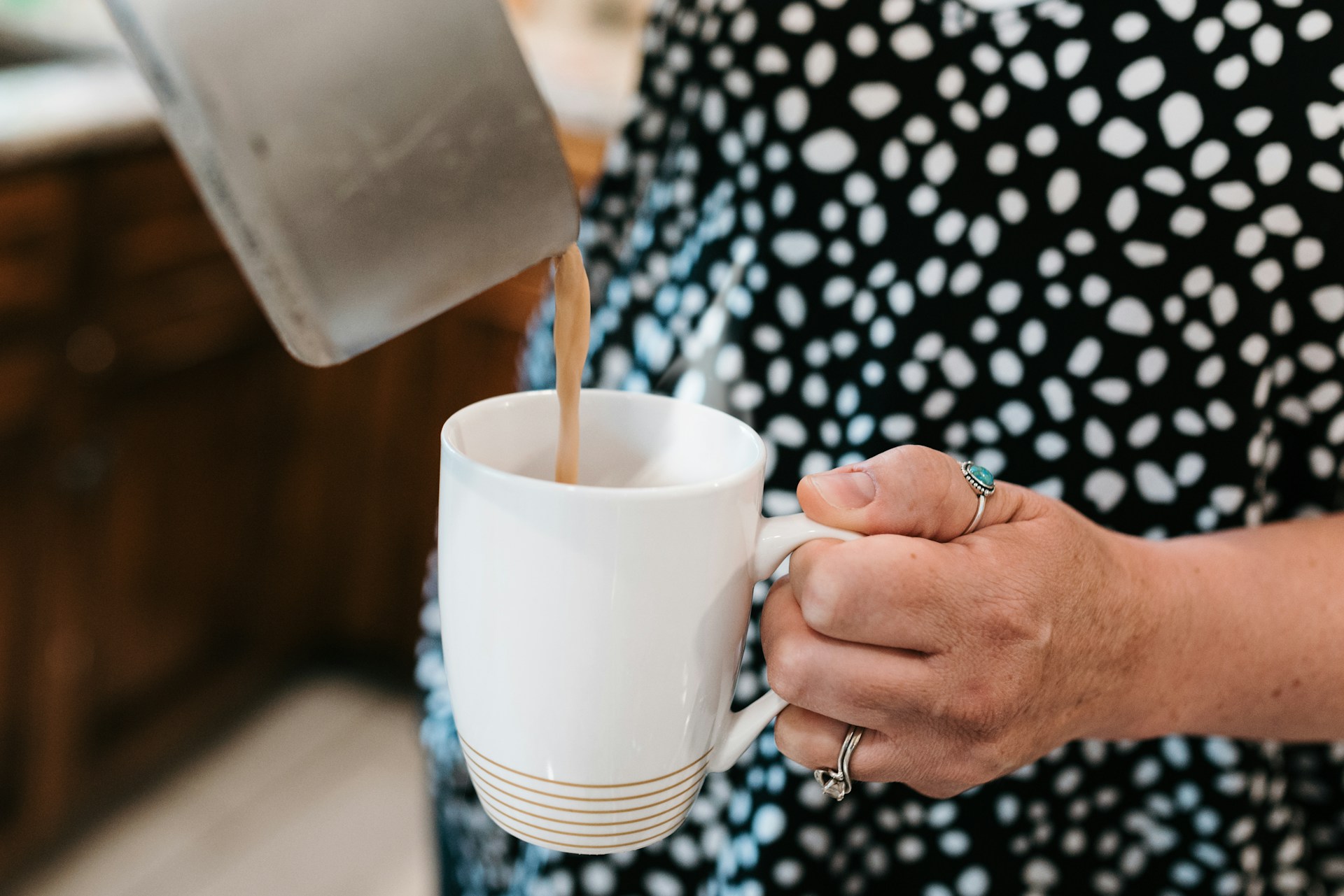 Mother pouring hot chocolate