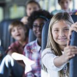 Children riding school bus