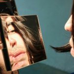 Man looking in mirror