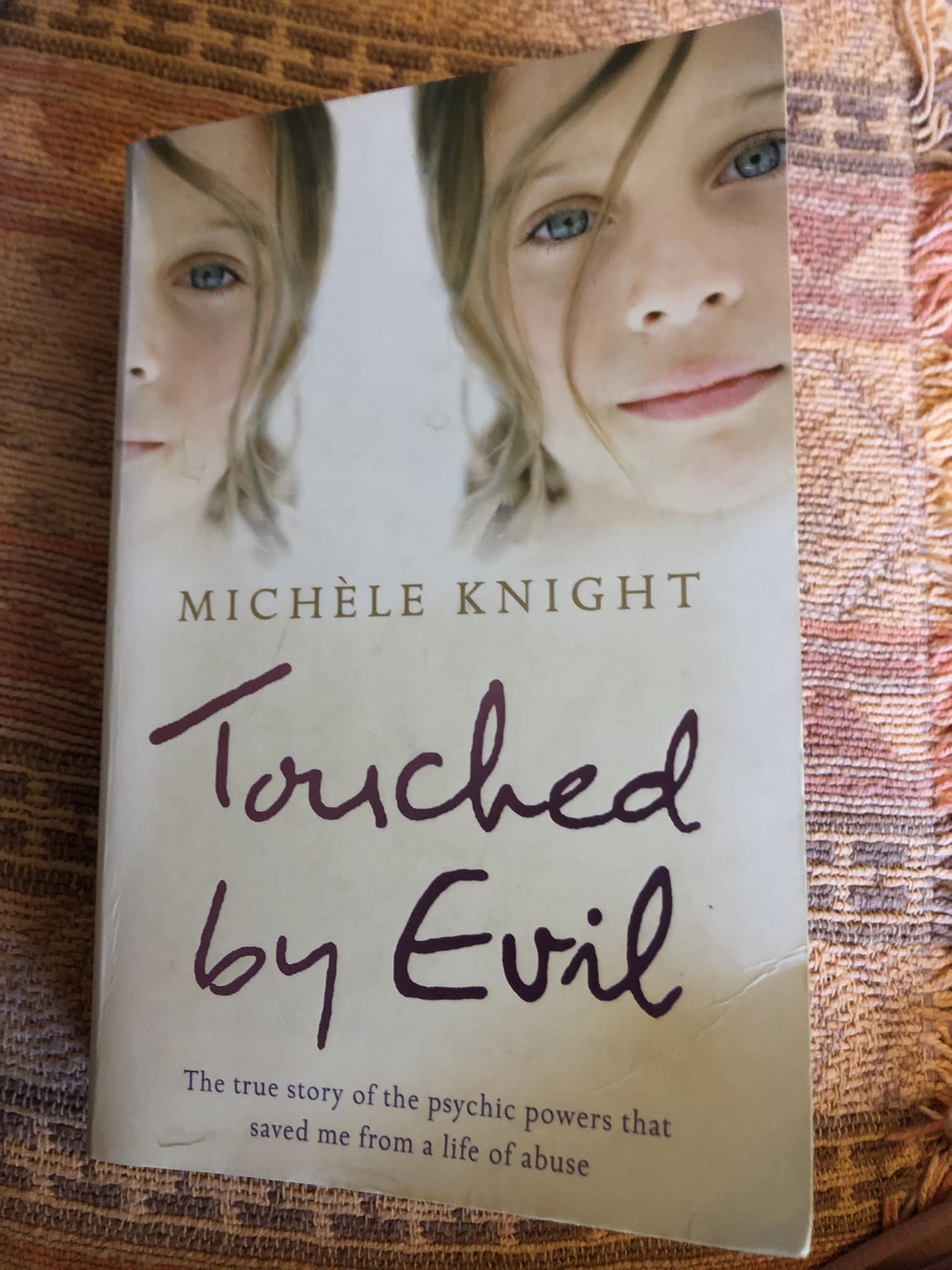 Touched by Evil by Michele Knight