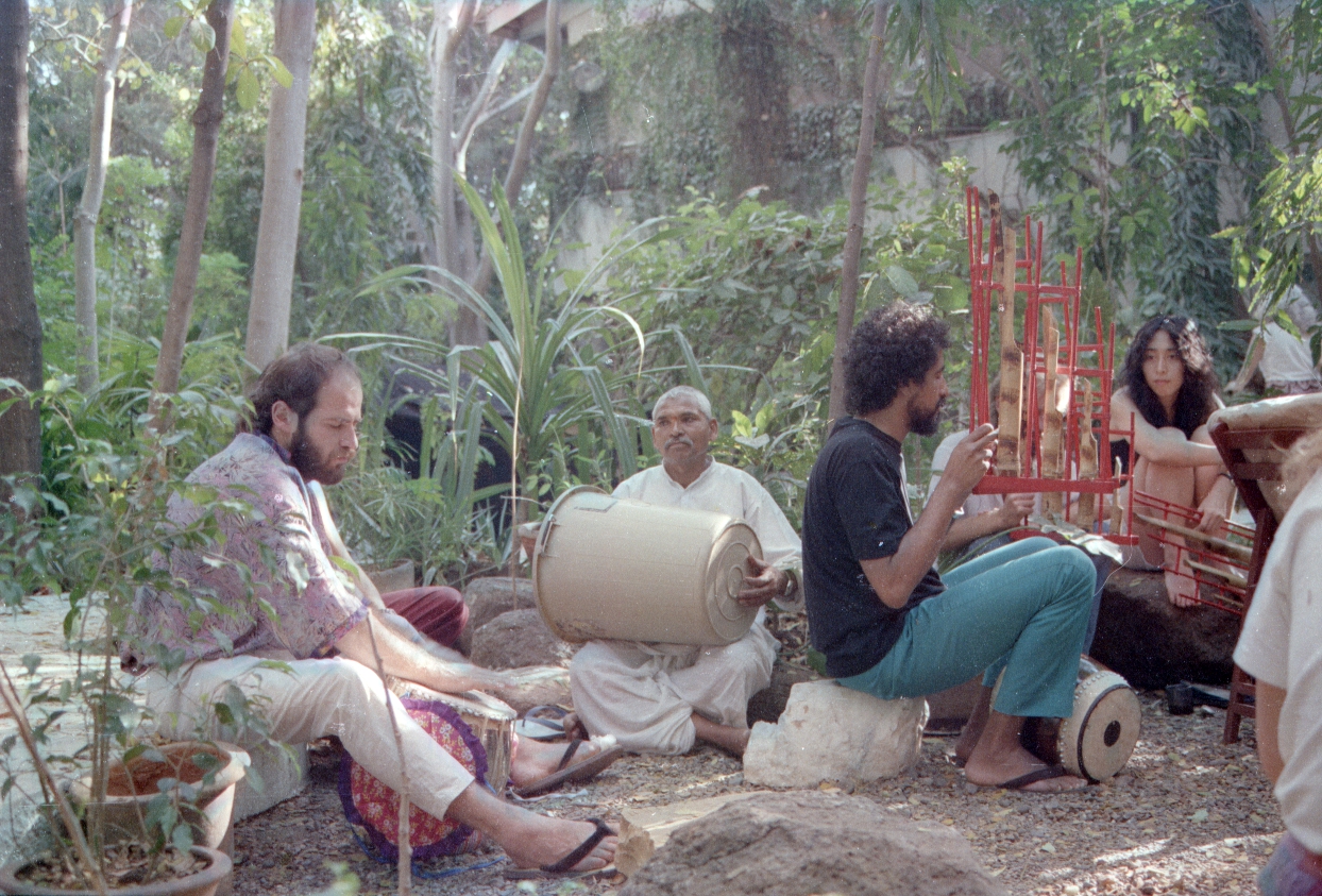 Mali playing garbage bin