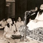 Laxmi and Jyoti listen to Osho at a discourse in Patkar Hall, Bombay