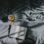 Book in bed with a cup if tea