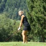 Woman playing golf
