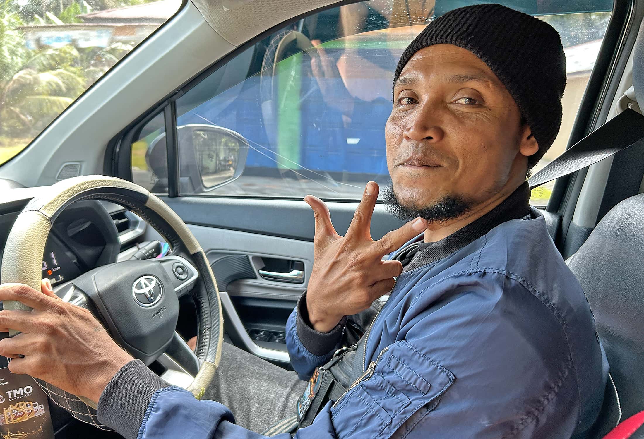 Taxi driver at the wheel