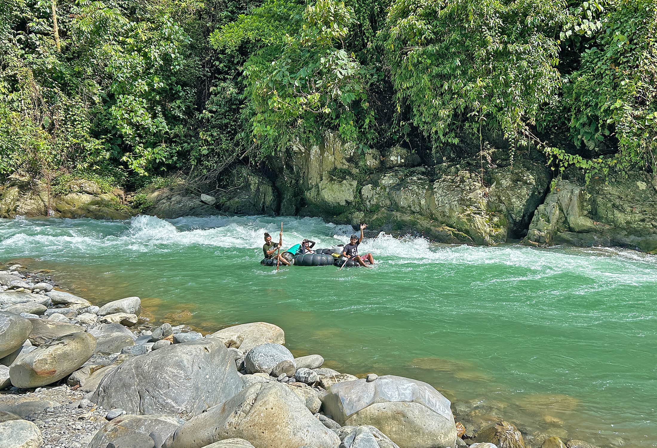 Long shot of boat in the river