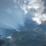 Sun rays behind clouds