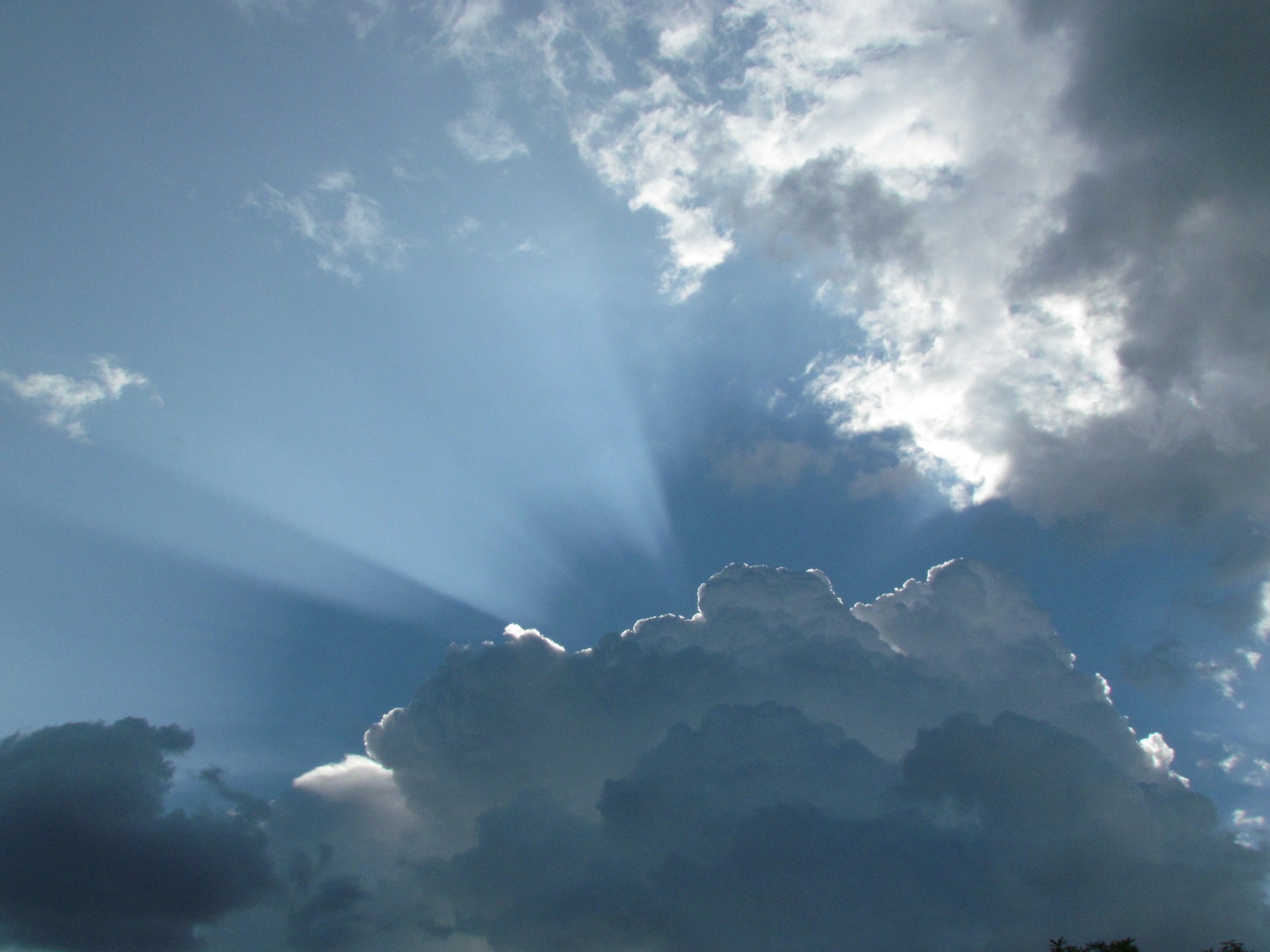 Sun rays behind clouds