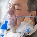 Man with oxygen mask