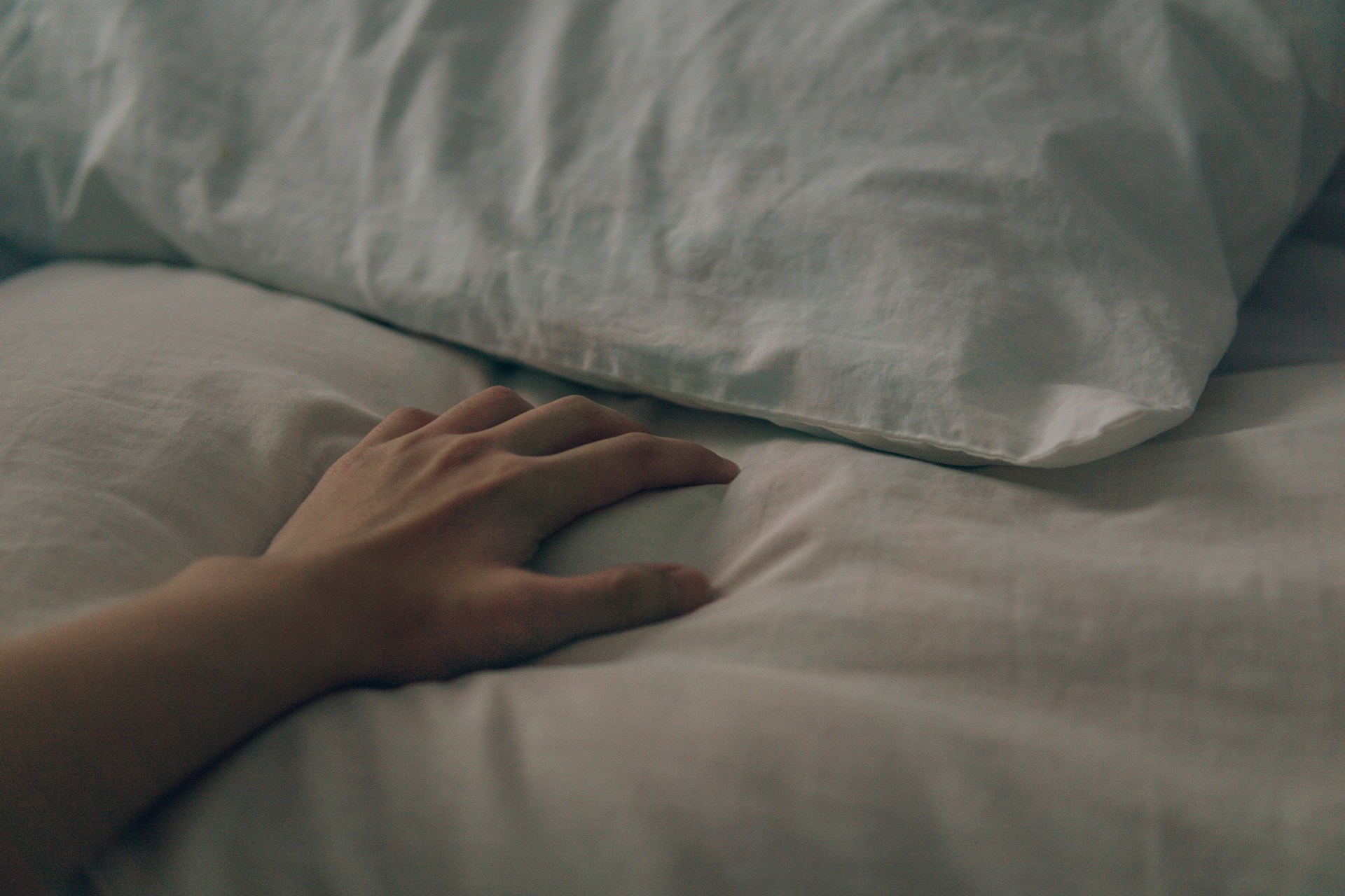 Hand on pillow