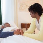 At the father's bed
