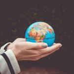 Holding the globe