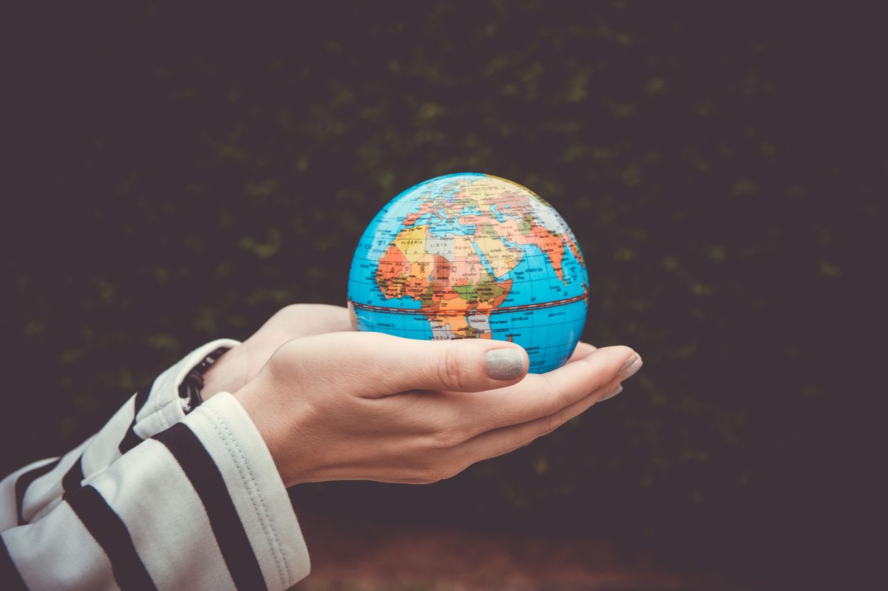 Holding the globe