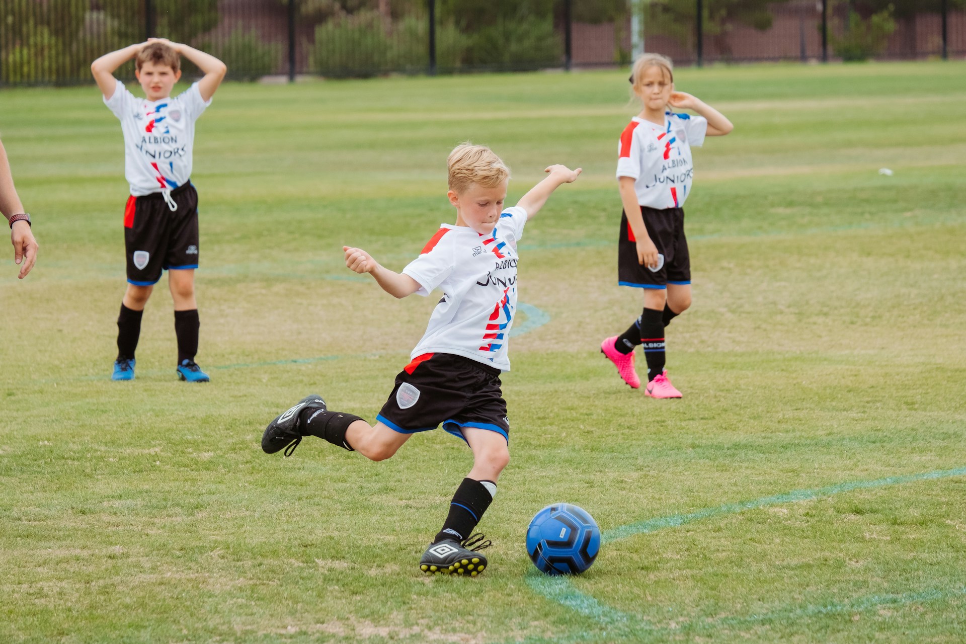 Children playing soccer