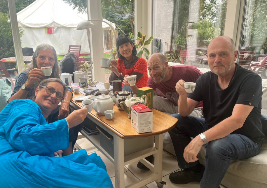 The group drinking tea