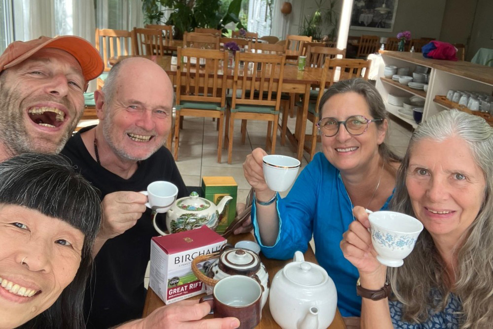 The group drinking tea