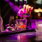 Preparing a drink at the bar