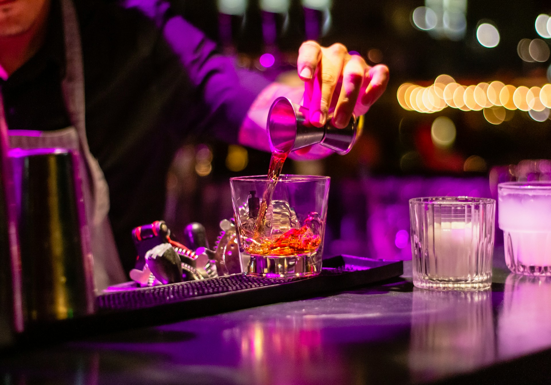 Preparing a drink at the bar